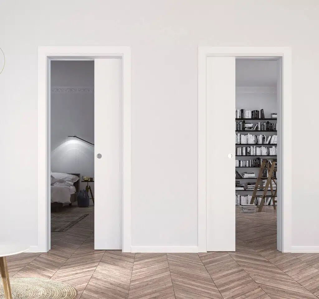 ECLISSE Unilaterale, controtelaio per ante contrapposte. Due porte scorrevoli a scomparsa nella stessa parete